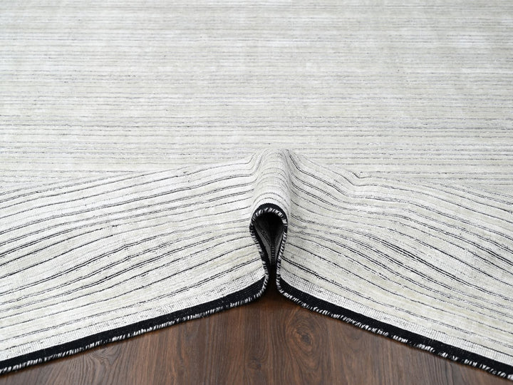 7'10" x 10'0" New Hand Loomed Ivory Wool and Plant based Silk Rectangle Oriental Rug - MOA10284334