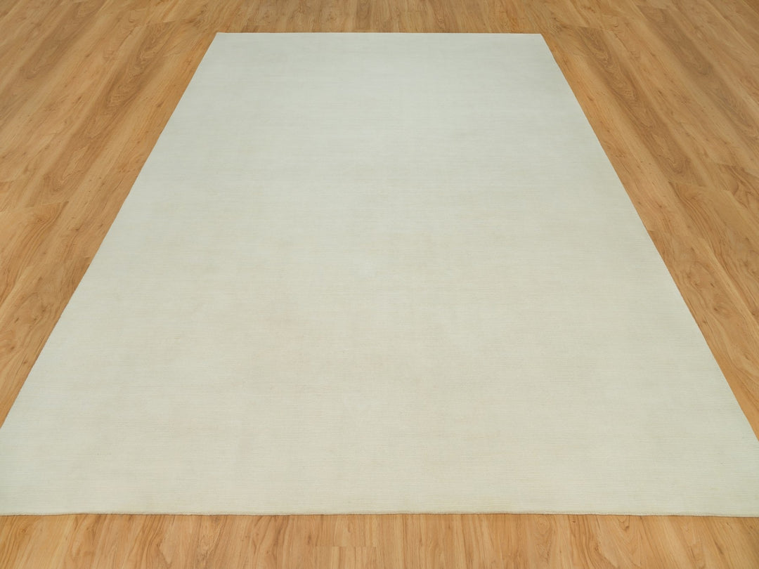 9'0" x 12'0" New Hand Loomed Ivory Wool Rectangle Oriental Rug - MOA10290380