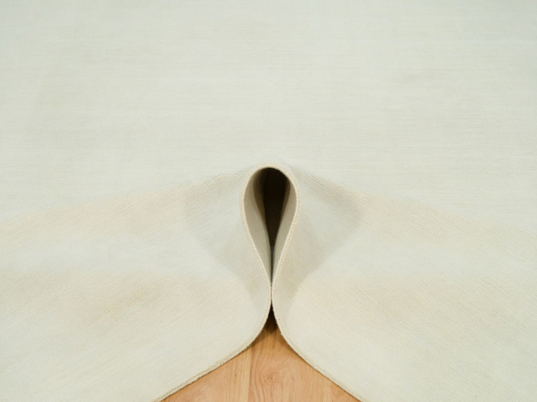 9'0" x 12'0" New Hand Loomed Ivory Wool Rectangle Oriental Rug - MOA10290380