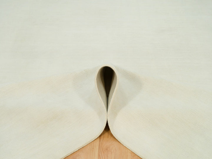 9'0" x 12'0" New Hand Loomed Ivory Wool Rectangle Oriental Rug - MOA10290380