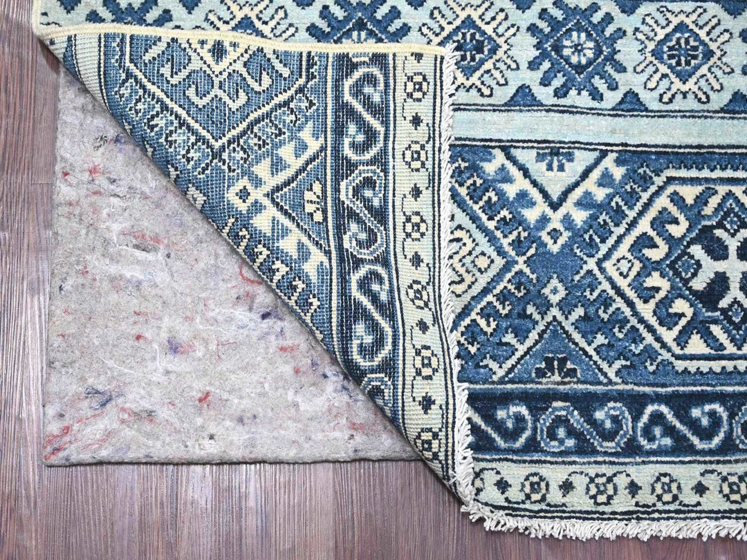 Antique oriental carpet with vintage detailing