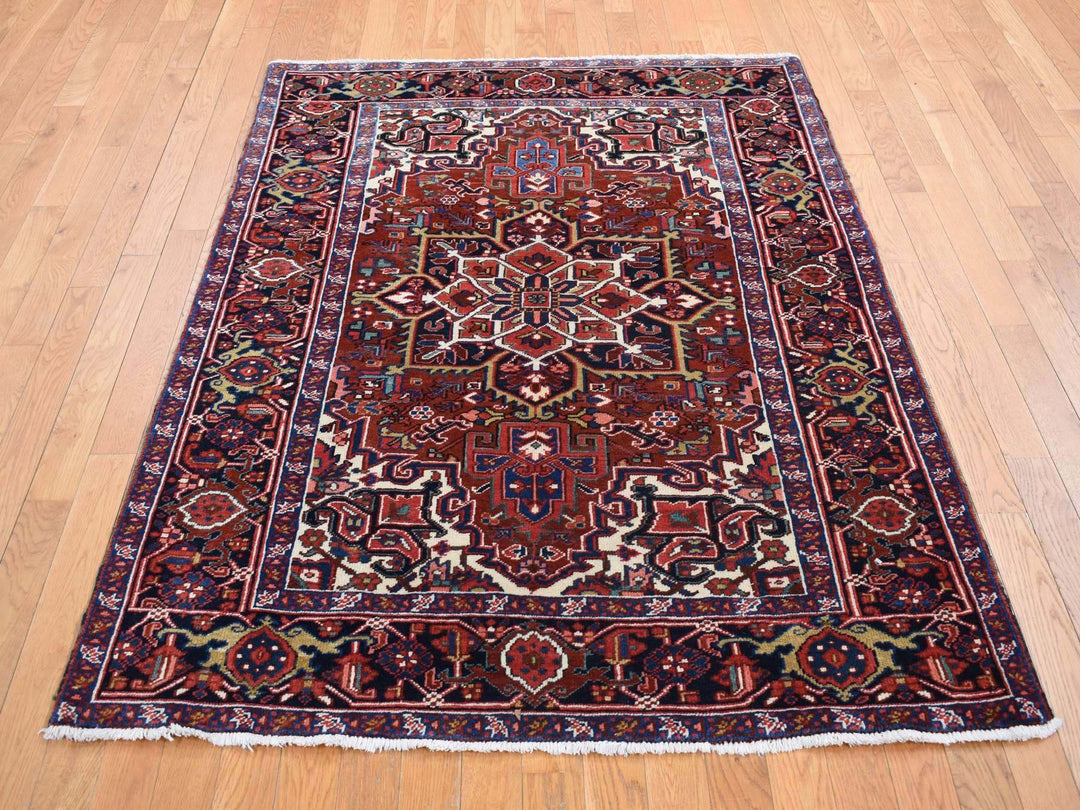 4'7" x 8'8" Vintage Hand Knotted Red Wool Rectangle Oriental Rug - MOA10287405